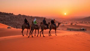 Camel ride Marrakech at sunset, showcasing tourists on camels in the Agafay Desert's stunning landscape.